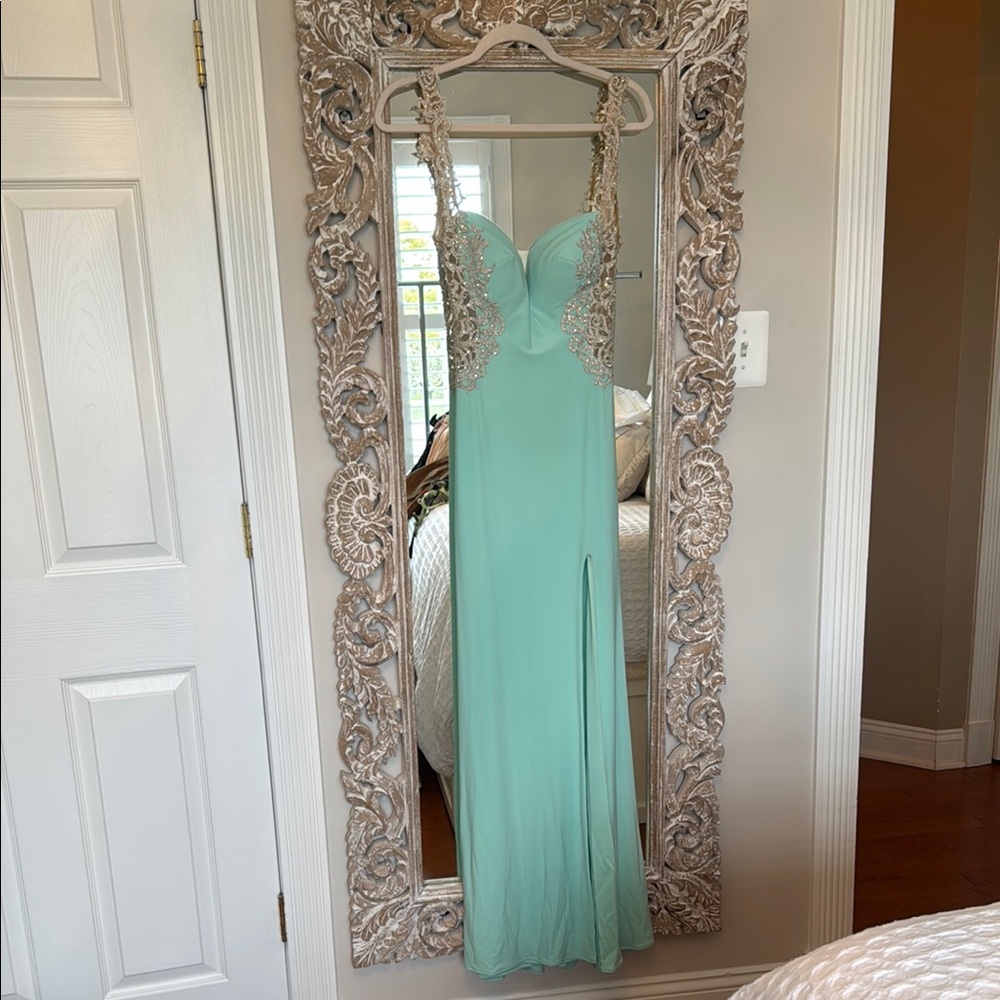 La Femme Elegant Mint Green Gown with Lace Details